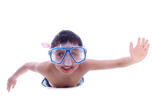 boy swimming with snorkel
