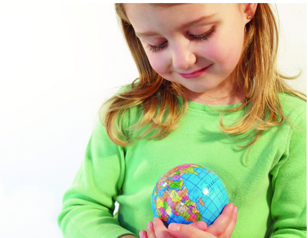 girl holding globe in hand
