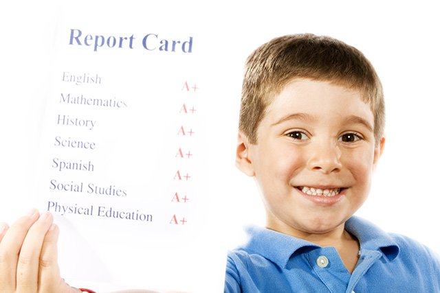 boy with report card