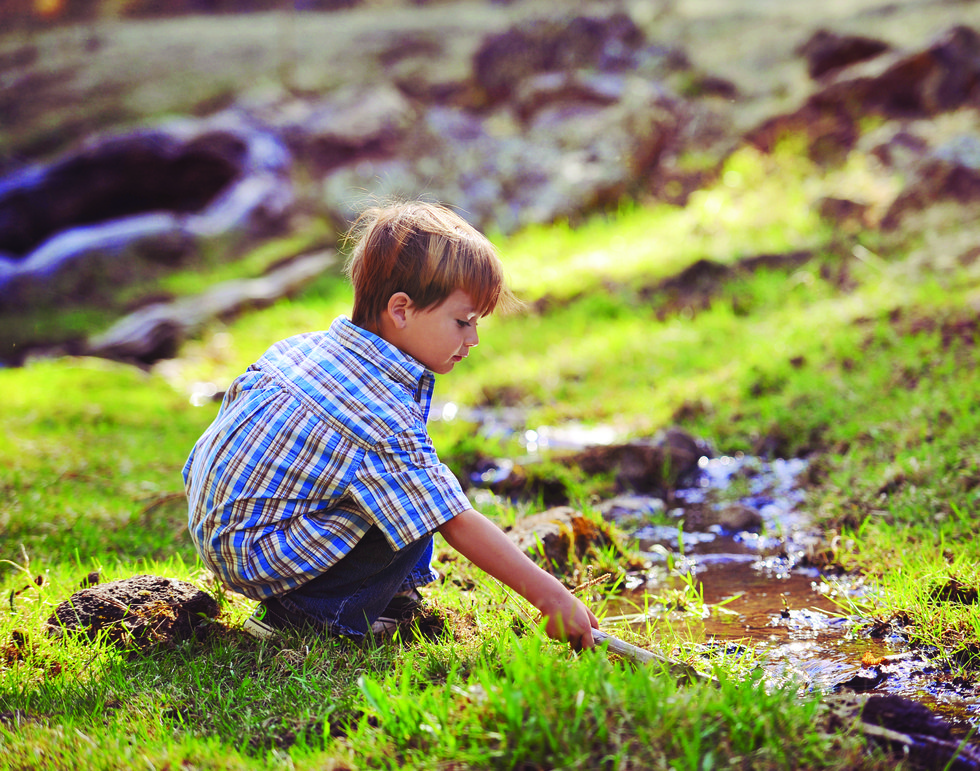 boy outside in nature