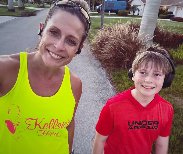 Rayna Overmyer and her son,  enjoy running together