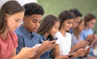 Teens on cell phones.jpg