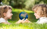 kids holding globe for Earth Day.jpg