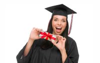 Happy teen graduate with a gift.jpg