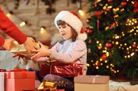 Girl receiving a gift for christmas.jpg