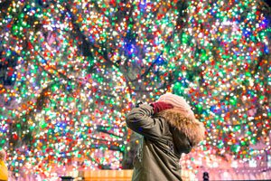 Young girl looking at the Rockefeller christmas tree