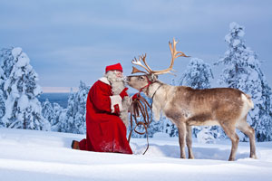 Santa-&-Reindeer-courtesy-of-visitromaniemi.com